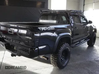 2021 Toyota Tacoma SR z VIN 3TMCZ5AN3MM420851, wystawiony jako Copart lot #55668255 z przebiegiem 61 329 mil mil oraz Szkoda całkowita • Salvage title. Historia ofert i sprzedaży dostępna na DreamBid. Obrazek 3.