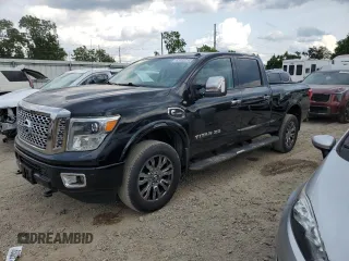 2016 Nissan Titan Platinum Reserve with VIN 1N6BA1F4XGN504958, listed as a Copart auction lot 63560315 with 181,696 mi miles and Clean title. Bid and sale history available at DreamBid. Image 1.
