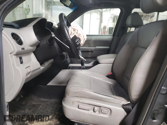 2012 Honda Pilot EX-L with VIN 5FNYF4H59CB017572, listed as a Copart auction lot 51532555 with 127,720 mi miles and Salvage Title. Bid and sale history available at DreamBid. Image 7.