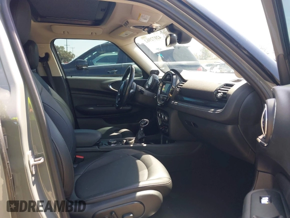 2019 MINI Clubman Cooper with VIN WMWLN5C57K2E34894, listed as a IAAI auction lot 42072962 with 49,274 mi miles and . Bid and sale history available at DreamBid. Image 5.