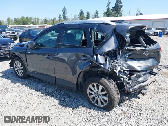 2015 Mazda CX-5 Sport z VIN JM3KE4BY5F0540612, wystawiony jako IAAI lot #42109082 z przebiegiem 83 874 mil mil oraz . Historia ofert i sprzedaży dostępna na DreamBid. Obrazek 3.
