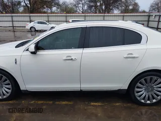 2013 Lincoln MKS with VIN 1LNHL9DK4DG605058, listed as a IAAI auction lot 41068489 with 101,801 mi miles. Bid and sale history available at carsss.com. Image 15.