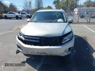 2015 Volkswagen Tiguan SE with VIN WVGAV7AX0FW544218, listed as a IAAI auction lot 41897418 with 97,235 mi miles and . Bid and sale history available at DreamBid. Image 13.