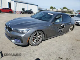 2018 BMW 7 Series 740e xDrive iPerformance with VIN WBA7J2C54JG938233, listed as a Copart auction lot 72694354 with 83,122 mi miles and Salvage Title. Bid and sale history available at carsss.com. Image 1.