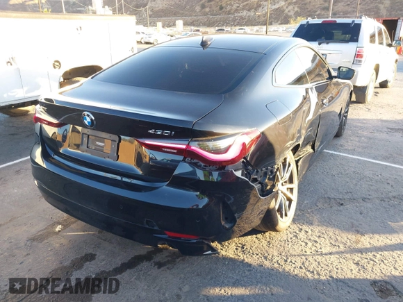 2022 BMW 4 Series 430i xDrive with VIN WBA73AP00NCJ16822, listed as a IAAI auction lot 41329235 with 30,570 mi miles and . Bid and sale history available at DreamBid. Image 3.
