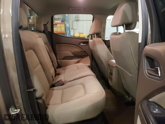 2015 GMC Canyon 4WD SLE z VIN 1GTG6BE3XF1242163, wystawiony jako Copart lot #57132035 z przebiegiem 110 241 mil mil oraz Szkoda całkowita • Salvage title. Historia ofert i sprzedaży dostępna na DreamBid. Obrazek 10.