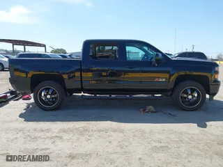 2015 Chevrolet Silverado 1500 LTZ with VIN 3GCUKSEC7FG508805, listed as a IAAI auction lot 42004524 with 150,748 mi miles. Bid and sale history available at carsss.com. Image 14.