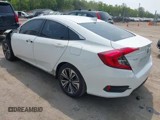 2016 Honda Civic EX-L z VIN 2HGFC1F79GH637326, wystawiony jako IAAI lot #42438274 z przebiegiem 215 846 mil mil oraz . Historia ofert i sprzedaży dostępna na DreamBid. Obrazek 3.