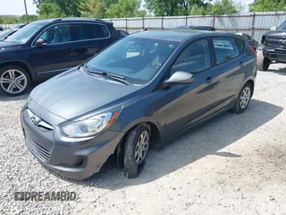 2013 Hyundai Accent GS with VIN KMHCT5AE7DU094139, listed as a IAAI auction lot 42312906 with 160,146 mi miles and . Bid and sale history available at DreamBid. Image 2.