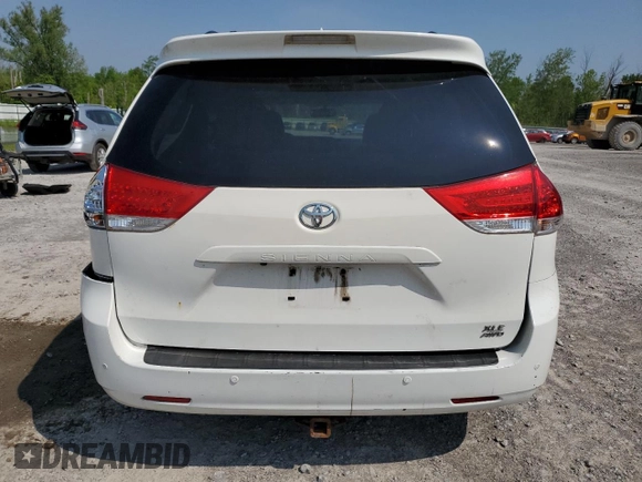 2011 Toyota Sienna XLE with VIN 5TDDK3DC4BS004280, listed as a Copart auction lot 59297345 with 173,890 mi miles and Salvage title. Bid and sale history available at DreamBid. Image 6.