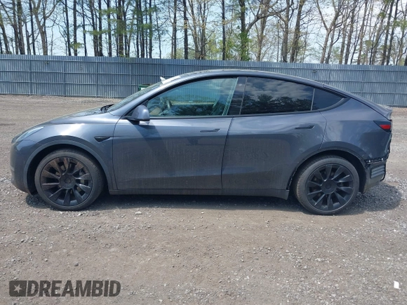 2020 Tesla Model Y Long Range with VIN 5YJYGDEE2LF029385, listed as a IAAI auction lot 42164786 with 58,685 mi miles and . Bid and sale history available at DreamBid. Image 14.