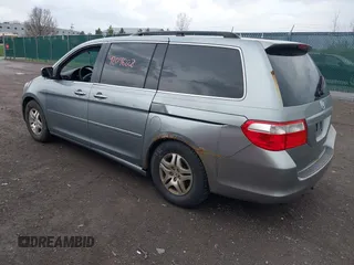 2005 Honda Odyssey EX-L with VIN 5FNRL38675B133498, listed as a IAAI auction lot 42046228 with 257,985 mi miles. Bid and sale history available at carsss.com. Image 3.