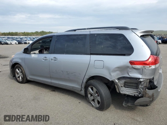 2011 Toyota Sienna LE AAS z VIN 5TDKK3DC4BS041885, wystawiony jako Copart lot #54929275 z przebiegiem 214 342 mil mil oraz Szkoda całkowita • Salvage title. Historia ofert i sprzedaży dostępna na DreamBid. Obrazek 2.