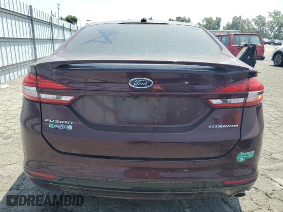 2017 Ford Fusion Titanium z VIN 3FA6P0SU8HR313773, wystawiony jako Copart lot #58791695 z przebiegiem 141 777 mil mil oraz Czysty tytuł • Clean title. Historia ofert i sprzedaży dostępna na DreamBid. Obrazek 6.
