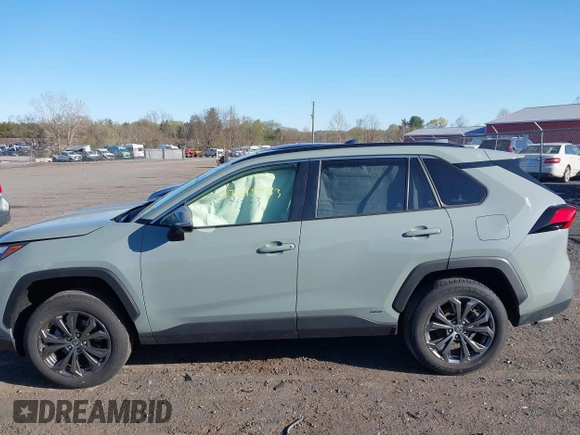 2023 Toyota RAV4 Hybrid XLE Premium with VIN JTMB6RFV3PD116696, listed as a IAAI auction lot 42044933 with 18,553 mi miles. Bid and sale history available at carsss.com. Image 14.