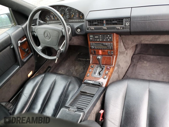 1994 Mercedes-Benz SL 5.0L with VIN WDBFA67E3RF102932, listed as a Copart auction lot 79107264 with 149,344 mi miles and Salvage title. Bid and sale history available at DreamBid. Image 8.