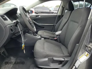 2014 Volkswagen Jetta S with VIN 3VW2K7AJ8EM231099, listed as a Copart auction lot 65752605 with 143,010 mi miles and Salvage title. Bid and sale history available at DreamBid. Image 7.