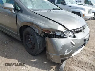2006 Honda Civic LX z VIN 2HGFA16576H524297, wystawiony jako IAAI lot #42205155 z przebiegiem 173 763 mil mil oraz . Historia ofert i sprzedaży dostępna na DreamBid. Obrazek 6.