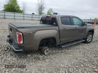 2016 GMC Canyon 4WD SLE z VIN 1GTG6CE38G1303839, wystawiony jako Copart lot #57387295 z przebiegiem 87 945 mil mil oraz Nie do naprawy. Historia ofert i sprzedaży dostępna na DreamBid. Obrazek 3.