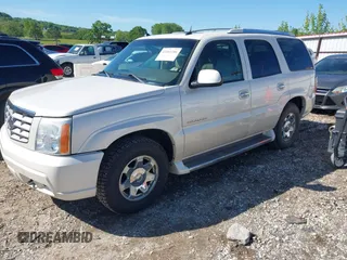 2005 Cadillac Escalade z VIN 1GYEC63N65R243624, wystawiony jako IAAI lot #42161106 z przebiegiem 150 877 mil mil oraz . Historia ofert i sprzedaży dostępna na DreamBid. Obrazek 2.