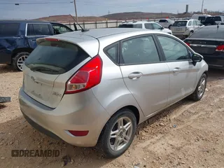 2019 Ford Fiesta SE with VIN 3FADP4EJ5KM157051, listed as a IAAI auction lot 41583827 with 112,813 mi miles. Bid and sale history available at carsss.com. Image 4.