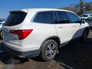 2016 Honda Pilot EX-L with VIN 5FNYF6H50GB073384, listed as a IAAI auction lot 41639667 with 99,267 mi miles. Bid and sale history available at carsss.com. Image 4.