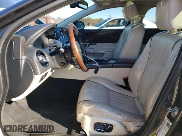 2015 Jaguar XJ Portfolio with VIN SAJWJ2GD1F8V77420, listed as a Copart auction lot 81786334 with 129,190 mi miles and Salvage title. Bid and sale history available at DreamBid. Image 7.