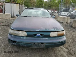 1995 Ford Taurus GL with VIN 1FALP52U8SA179395, listed as a Copart auction lot 53614265 with 71,082 mi miles and Salvage title. Bid and sale history available at DreamBid. Image 5.