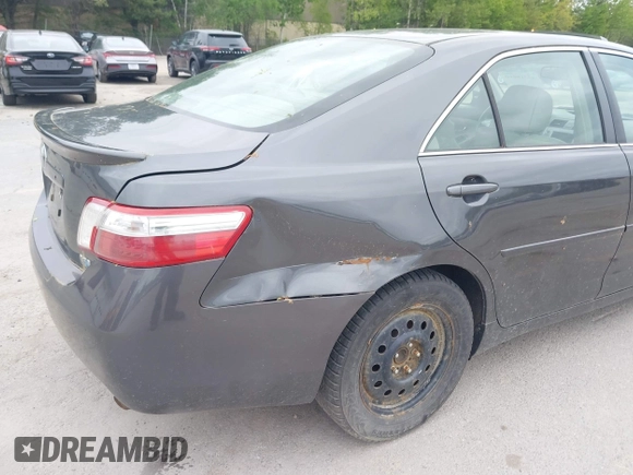 2007 Toyota Camry z VIN 4T1BB46K27U001703, wystawiony jako IAAI lot #42316610 z przebiegiem 211 752 mil mil oraz . Historia ofert i sprzedaży dostępna na DreamBid. Obrazek 6.