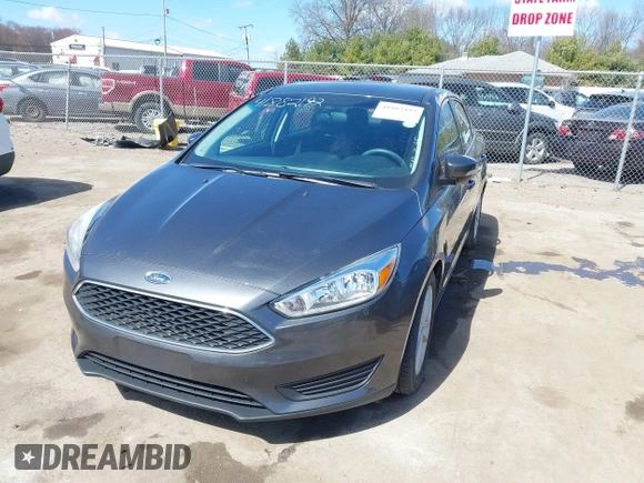 2017 Ford Focus SE with VIN 1FADP3F26HL229452, listed as a IAAI auction lot 41882192 with 83,499 mi miles. Bid and sale history available at carsss.com. Image 2.