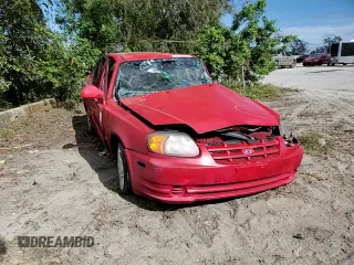 2005 Hyundai Accent GLS with VIN KMHCG45CX5U618473, listed as a Copart auction lot 76752994 with 0 mi miles and Salvage Title. Bid and sale history available at carsss.com. Image 11.