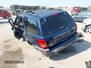 2000 Jeep Grand Cherokee Laredo with VIN 1J4G248S5YC413977, listed as a IAAI auction lot 42045808 with Not provided miles and . Bid and sale history available at DreamBid. Image 3.