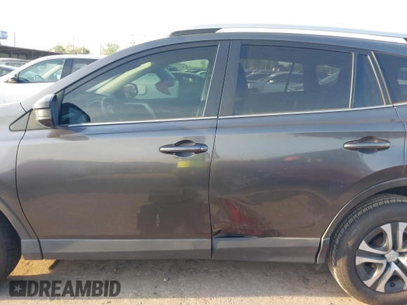 2016 Toyota RAV4 LE with VIN JTMZFREV5GJ097330, listed as a IAAI auction lot 41884397 with 107,699 mi miles. Bid and sale history available at carsss.com. Image 14.