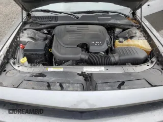 2012 Dodge Challenger SXT Plus z VIN 2C3CDYAG1CH254512, wystawiony jako Copart lot #59034895 z przebiegiem 152 597 mil mil oraz Szkoda całkowita • Salvage title. Historia ofert i sprzedaży dostępna na DreamBid. Obrazek 11.