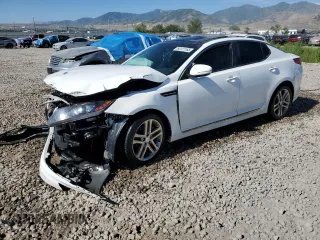 2013 Kia Optima SX with VIN 5XXGR4A60DG213906, listed as a Copart auction lot 60121165 with 121,559 mi miles and Salvage title. Bid and sale history available at DreamBid. Image 1.