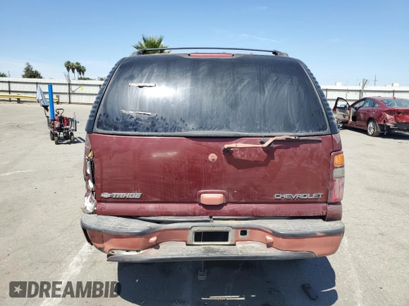 2001 Chevrolet Tahoe LT with VIN 1GNEC13T71R164164, listed as a Copart auction lot 60066165 with 234,506 mi miles and Salvage title. Bid and sale history available at DreamBid. Image 6.