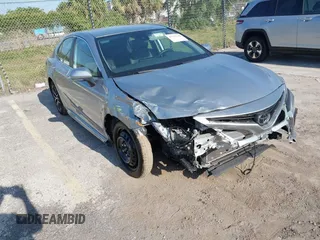 2023 Toyota Camry SE with VIN 4T1G11AK5PU750719, listed as a IAAI auction lot 42133210 with 55,688 mi miles. Bid and sale history available at carsss.com. Image 1.