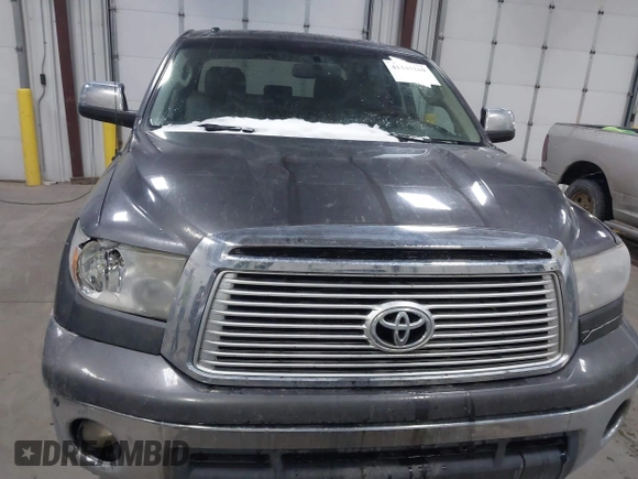 2012 Toyota Tundra 4WD Truck LTD with VIN 5TFHW5F14CX267765, listed as a IAAI auction lot 41345269 with 221,400 mi miles. Bid and sale history available at carsss.com. Image 12.