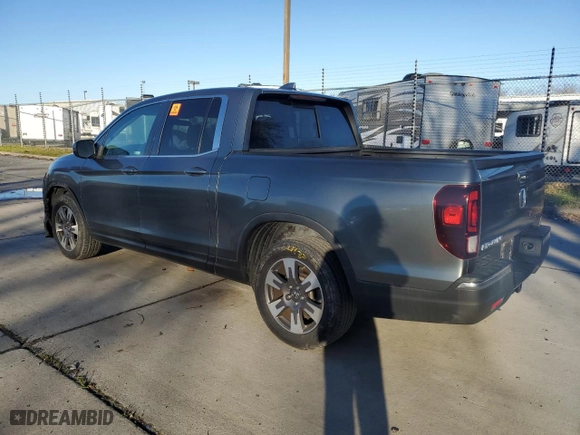 2019 Honda Ridgeline RTL with VIN 5FPYK2F56KB002827, listed as a Copart auction lot 44001105 with 59,343 mi miles and Salvage Title. Bid and sale history available at carsss.com. Image 2.