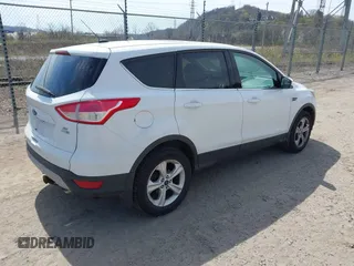 2014 Ford Escape SE with VIN 1FMCU9GXXEUC50365, listed as a IAAI auction lot 41891030 with 70,399 mi miles. Bid and sale history available at carsss.com. Image 4.