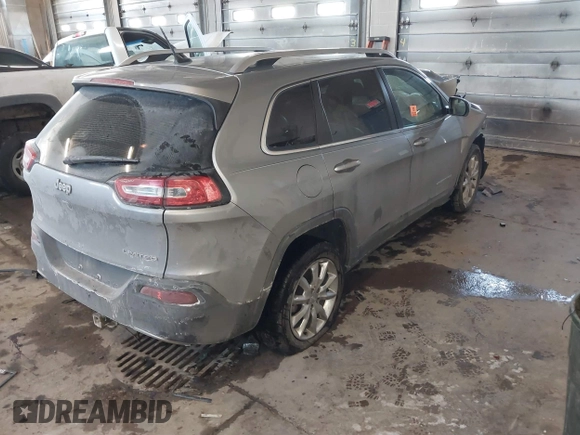 2015 Jeep Cherokee Limited with VIN 1C4PJLDB0FW505891, listed as a IAAI auction lot 41620674 with 120,804 mi miles and . Bid and sale history available at DreamBid. Image 4.