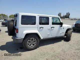 2015 Jeep Wrangler Unlimited Rubicon with VIN 1C4BJWFG6FL508493, listed as a Copart auction lot 54788635 with 127,694 mi miles and Salvage title. Bid and sale history available at DreamBid. Image 3.