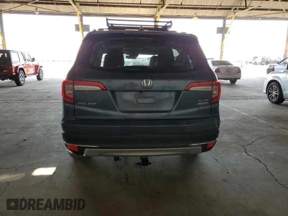 2022 Honda Pilot Elite z VIN 5FNYF6H04NB000987, wystawiony jako Copart lot #58584505 z przebiegiem 73 489 mil mil oraz Szkoda całkowita • Salvage title. Historia ofert i sprzedaży dostępna na DreamBid. Obrazek 6.