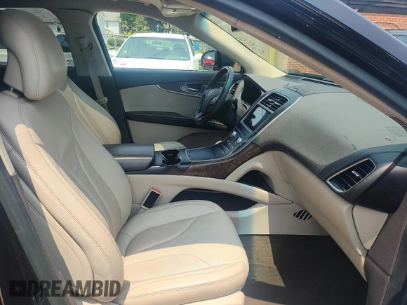 2016 Lincoln MKX Reserve z VIN 2LMTJ8LRXGBL60419, wystawiony jako Copart lot #59729465 z przebiegiem 128 657 mil mil oraz Czysty tytuł • Clean title. Historia ofert i sprzedaży dostępna na DreamBid. Obrazek 5.