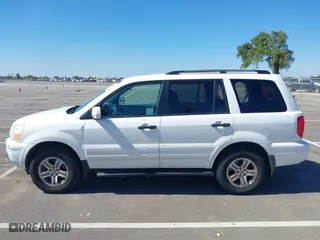 2004 Honda Pilot EX with VIN 2HKYF18424H564482, listed as a IAAI auction lot 41868124 with 173,484 mi miles. Bid and sale history available at carsss.com. Image 14.
