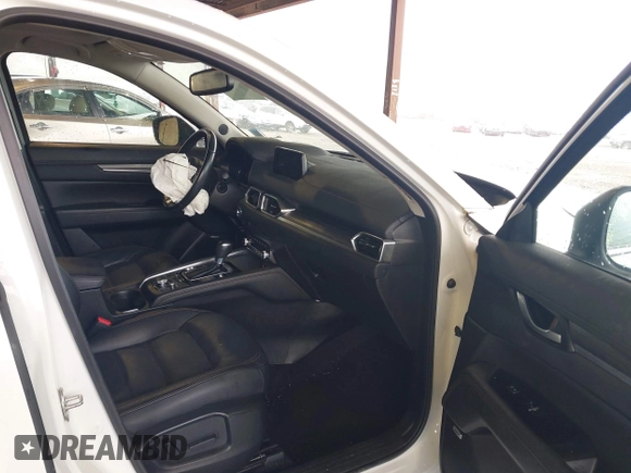 2019 Mazda CX-5 Grand Touring with VIN JM3KFBDMXK0648813, listed as a IAAI auction lot 42524680 with 23,521 mi miles and . Bid and sale history available at DreamBid. Image 5.