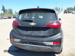 2018 Chevrolet Bolt EV Premier z VIN 1G1FX6S03J4130637, wystawiony jako IAAI lot #42185946 z przebiegiem 39 014 mil mil oraz . Historia ofert i sprzedaży dostępna na DreamBid. Obrazek 17.