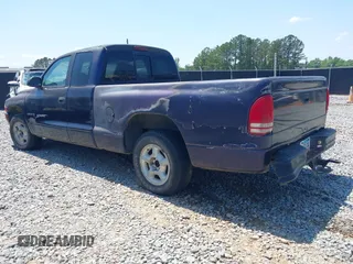 1998 Dodge Dakota SLT with VIN 1B7GL22X3WS569885, listed as a IAAI auction lot 42128994 with 1 mi miles. Bid and sale history available at carsss.com. Image 3.