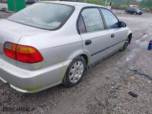 1999 Honda Civic DX with VIN 1HGEJ6628XL028492, listed as a IAAI auction lot 42071358 with 285,769 mi miles. Bid and sale history available at carsss.com. Image 12.