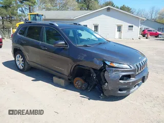2014 Jeep Cherokee Limited with VIN 1C4PJMDSXEW309171, listed as a IAAI auction lot 42038729 with 74,973 mi miles. Bid and sale history available at carsss.com. Image 1.